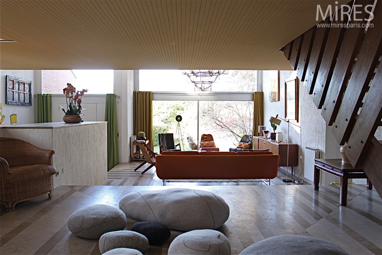 Pebble poufs and 70s furniture. C0665