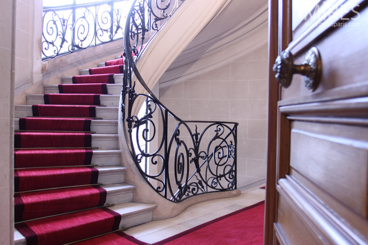 Wrought iron railings and red carpet. C0673