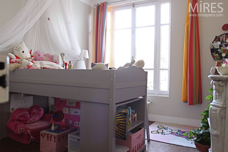 C0646 – Gray loft bed and multicoloured curtains