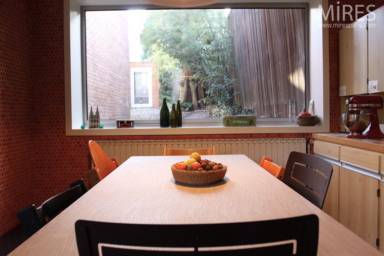 Wooden furniture and orange round mosaic tile. C0665