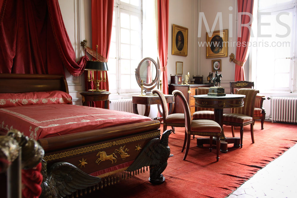 C0380 – Red and gold bedroom with chapel view