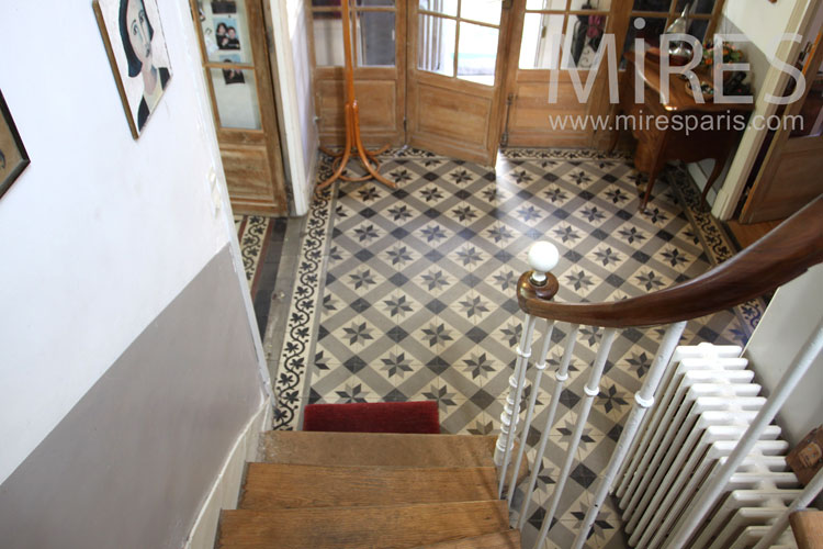 Staircase and tiled entrance. c1044