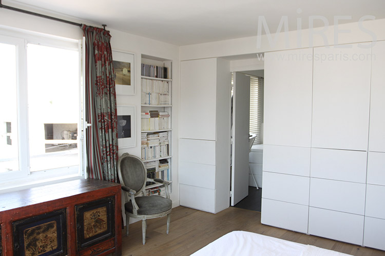 C1219 – White bedroom with bathroom