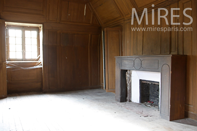 Wooden bedroom with chimney. C1265