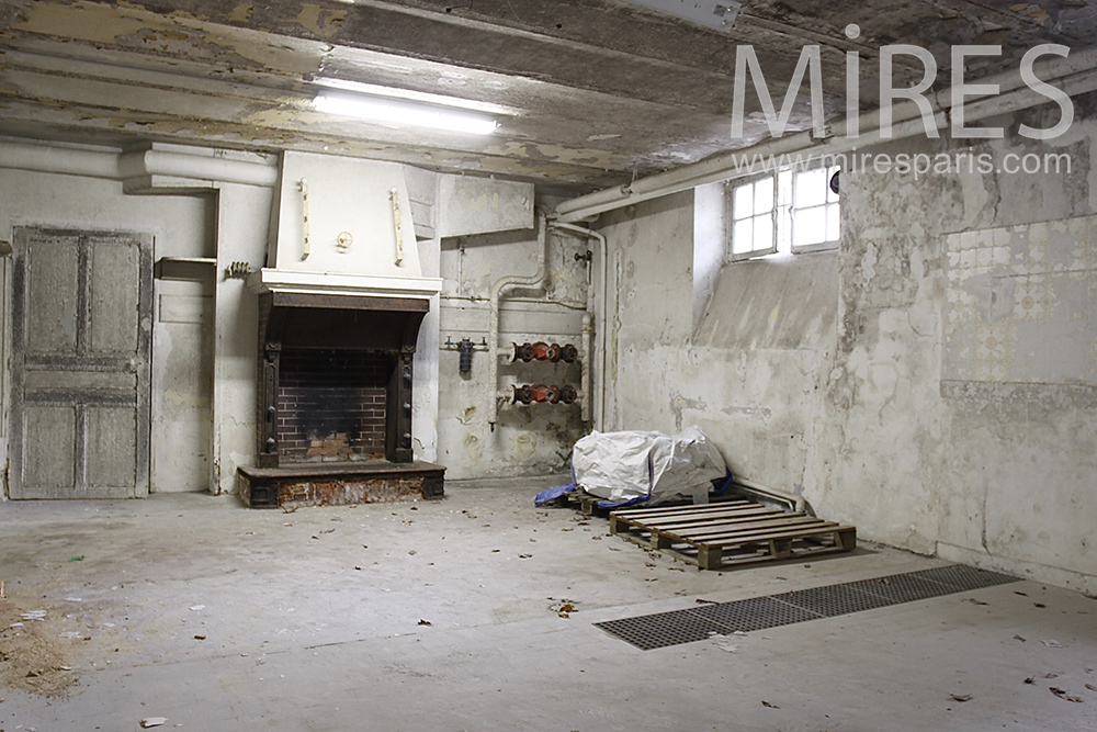 Basement with fireplace. C1461