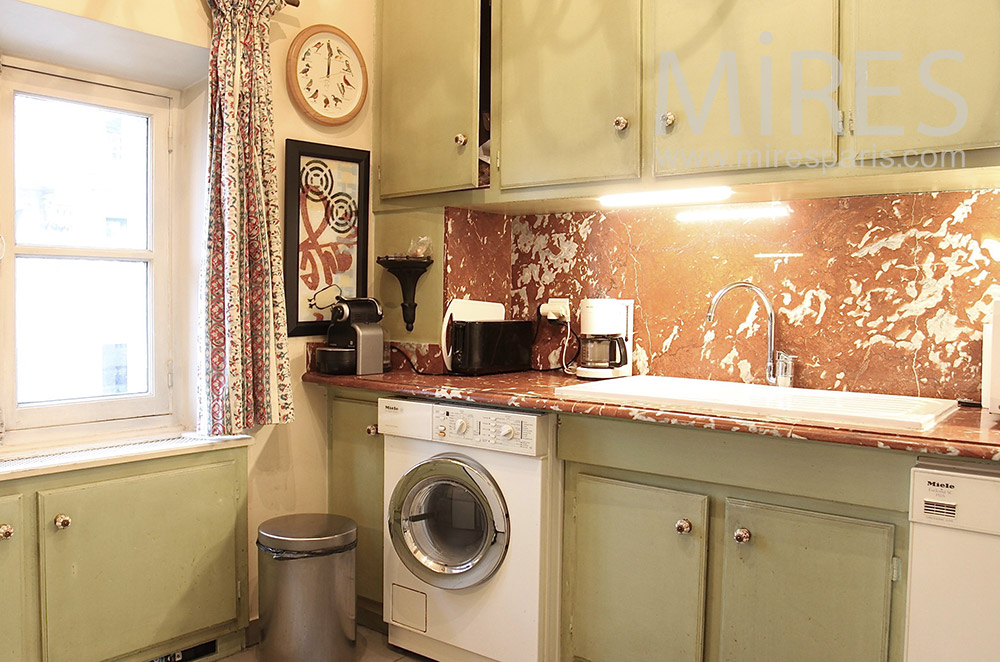 Patinated marble kitchen. c1529
