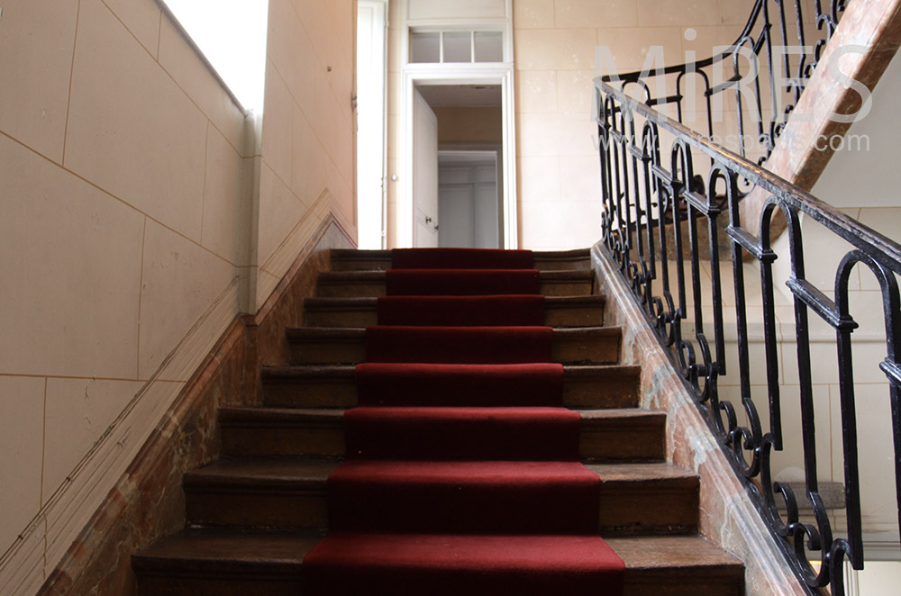 Staircase and red carpet. C1533