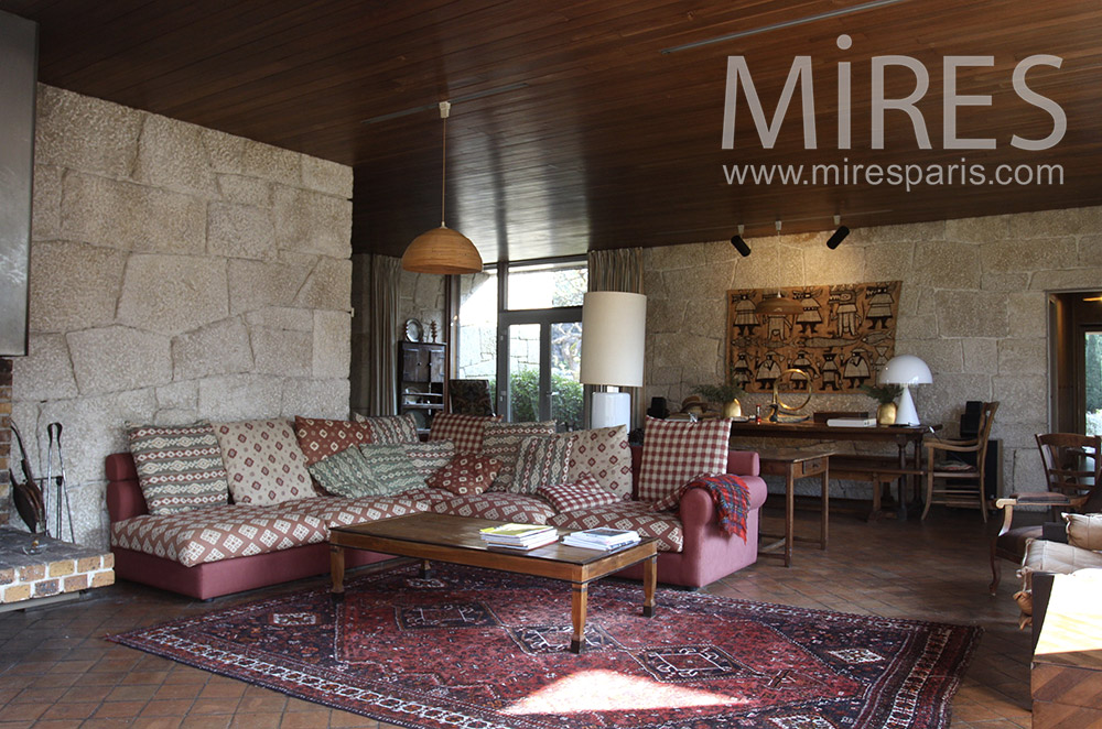 Corner living room and stone wall. c1541