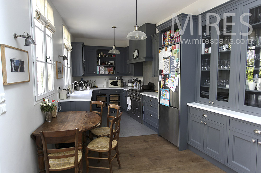 C1573 – Gray wood kitchen and small table