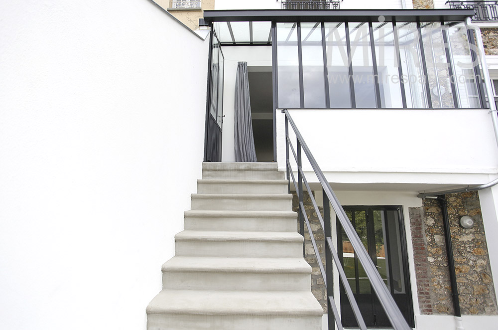 Outside staircase and small veranda. C1583