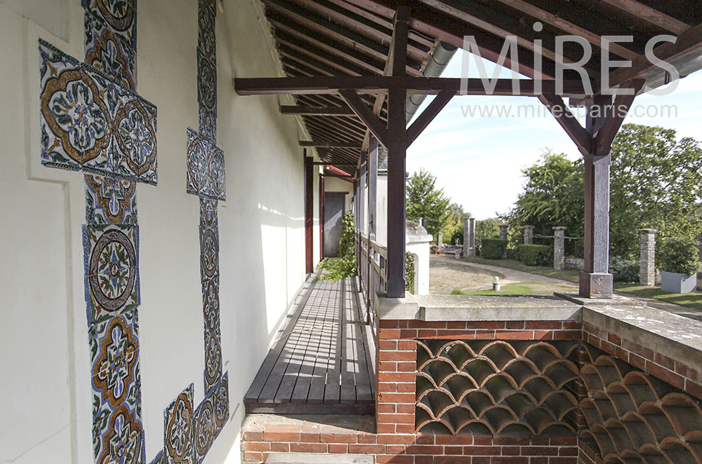 Brick balcony and wooden walkway. c1597