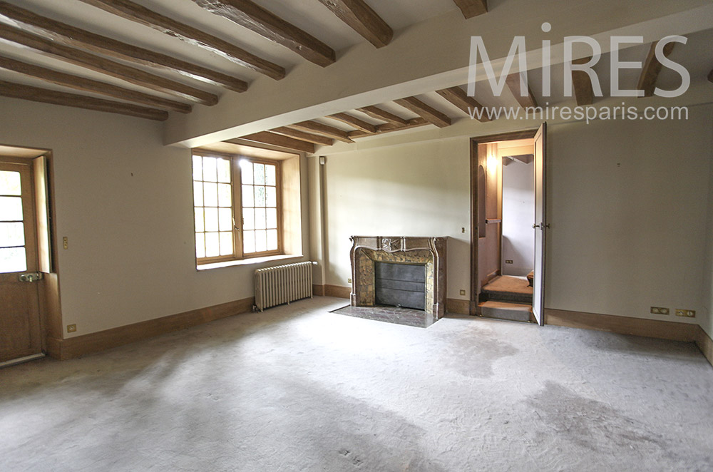 Empty room, beams and white carpet. C1604