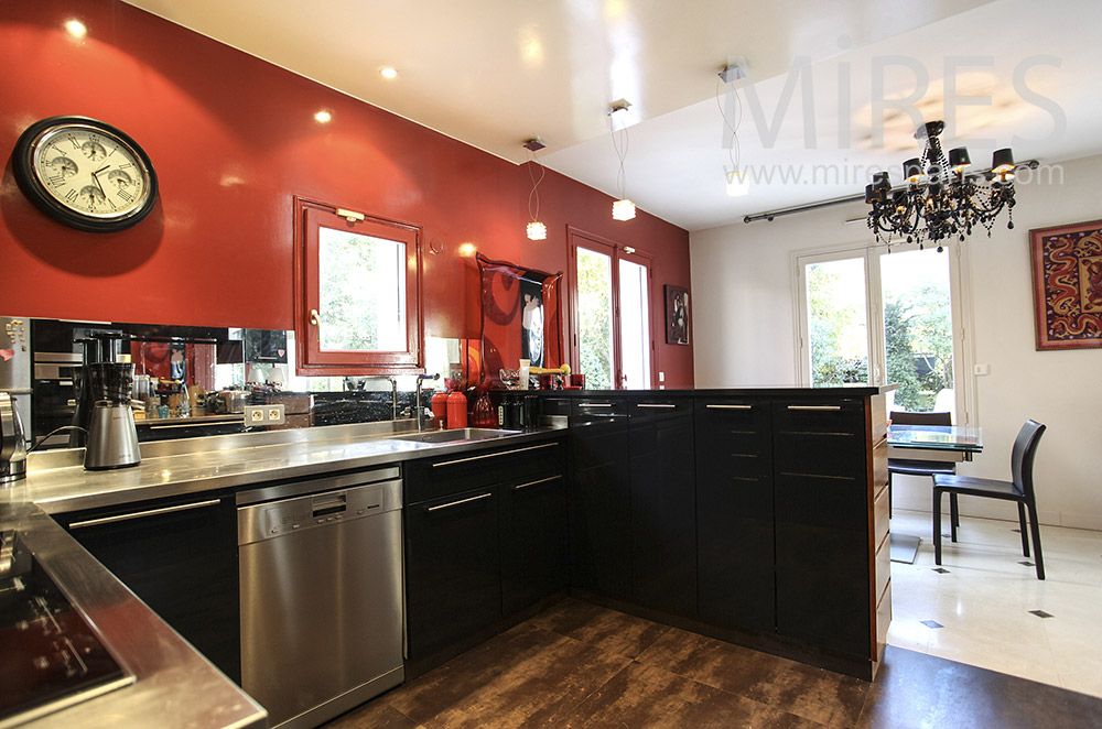 Red and black open kitchen. c1627