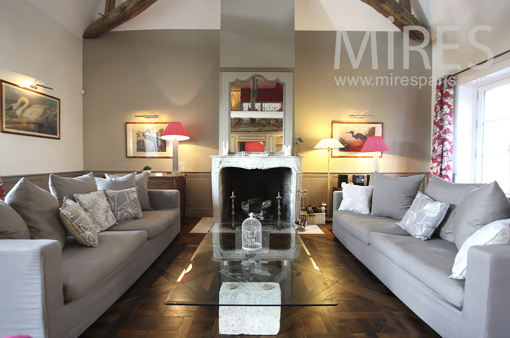 Symmetrical living room and marble fireplace. c1630