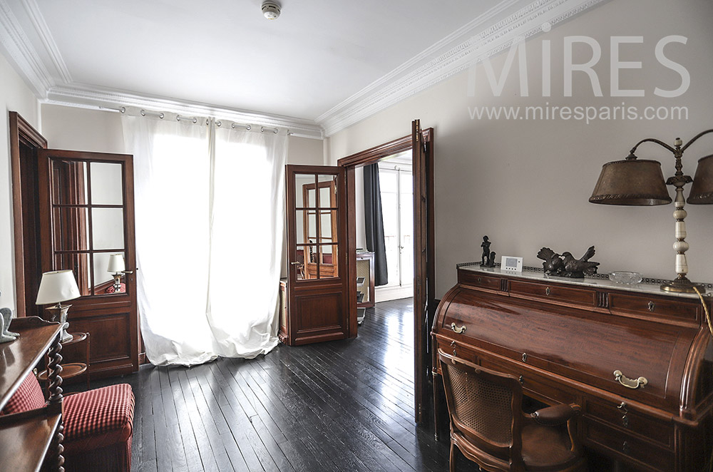 Old desk and black parquet. c0800