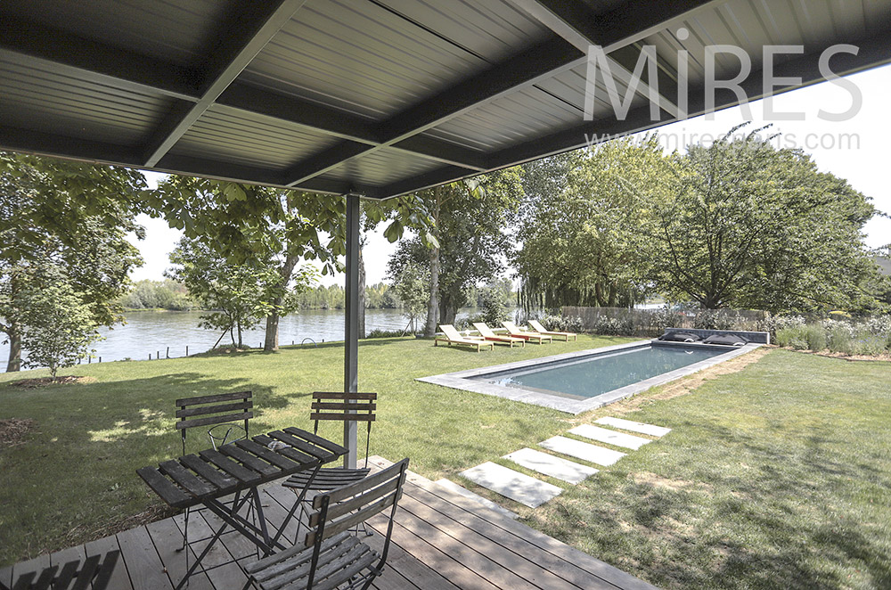 Pool with wooden bungalow. c0815