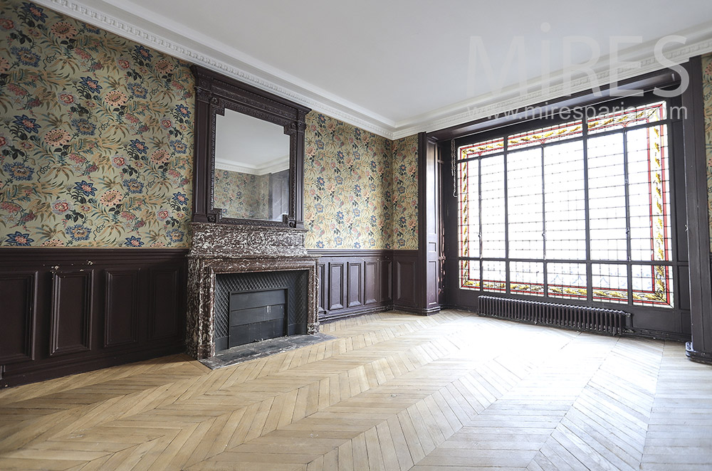 Vintage lounge and stained glass window. C1754