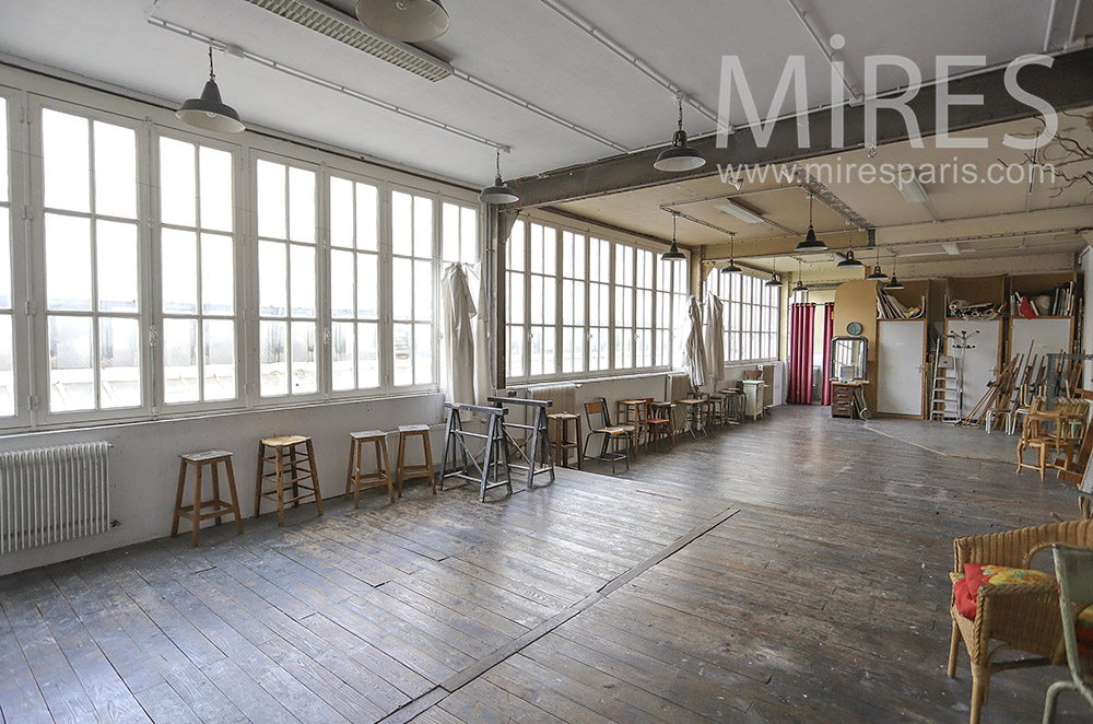 Bright workshop, weathered parquet. C1875