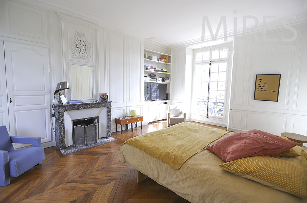 Nice room, wooden floor, fireplace. C1897