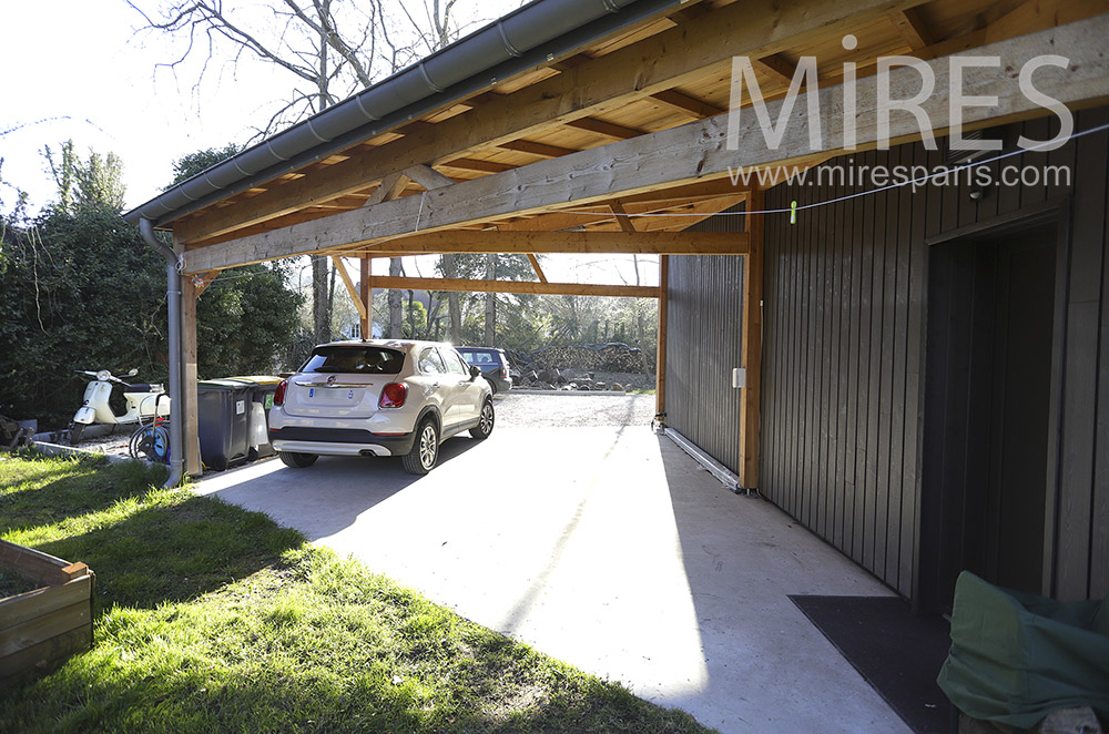 Open wooden garage. C1904