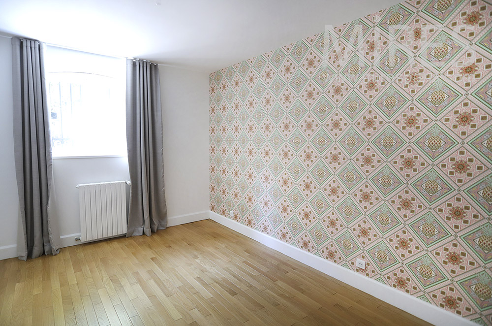 Two children’s bedrooms with wallpaper. C1935