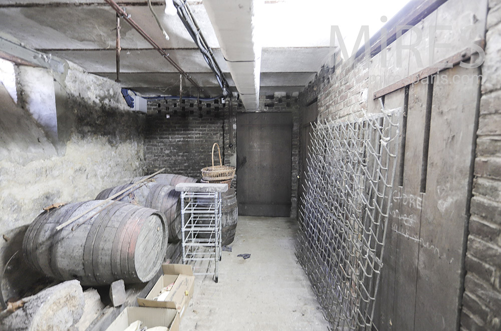 C1958 – Cellar and wine barrels