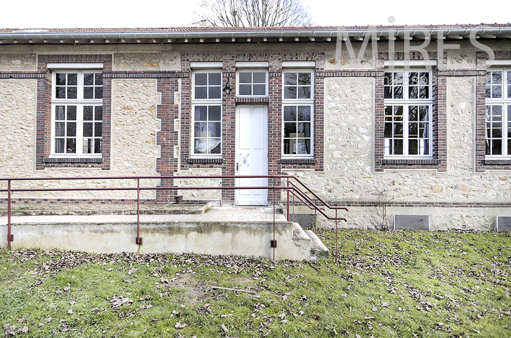 Brick and stone facade. C1961