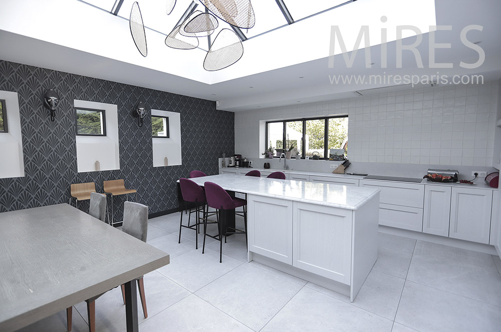 Large designer kitchen under glass roof. C1954