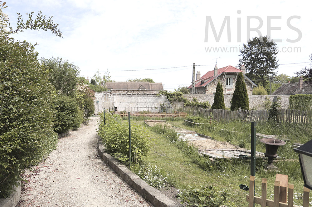 C1997 – Abandoned greenhouse and vegetable garden