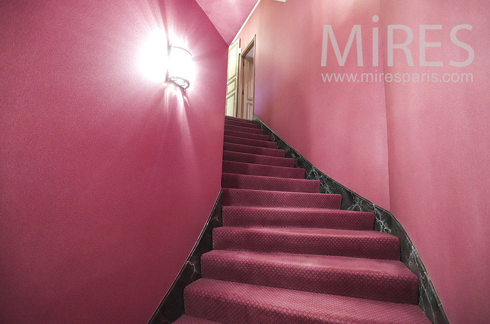 Staircase and red corridors. C2017