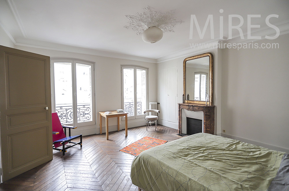 C2063 – Bedroom, fireplace and wooden floor