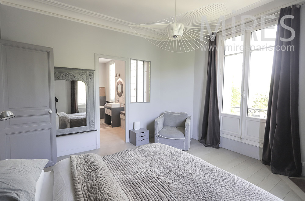 C2103 – Gray bedroom with bathroom