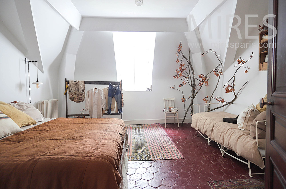 White room with red floor tiles. C2126